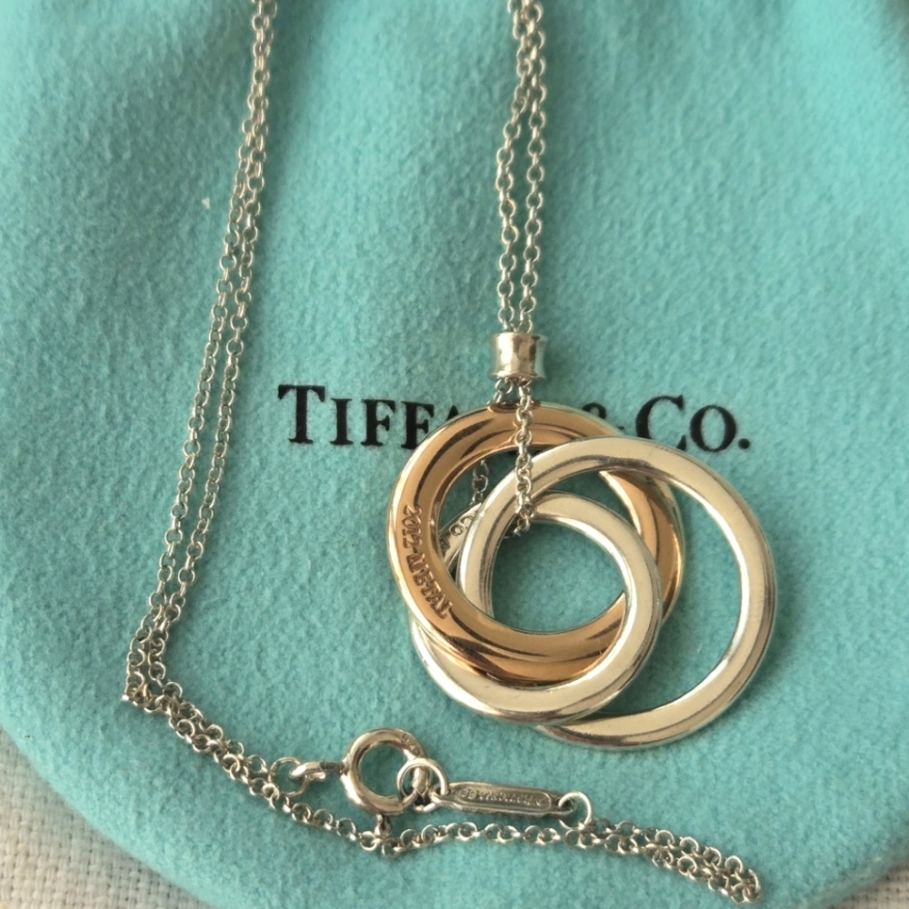 Tiffany & Co. Interlocking Rings Necklace in Silver and Gold Tones